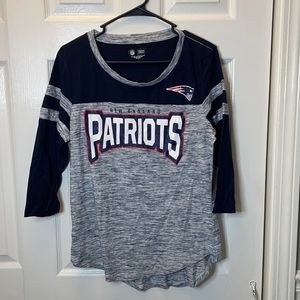 Woman’s Patriots T size L